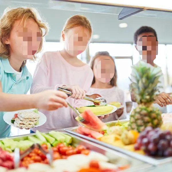 Children serving fresh fruit and vegetables at a buffet at Hibachi Catering 4 U, a Chinese restaurant in Anselmo