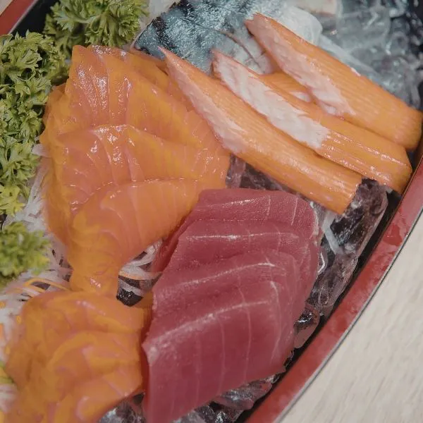 Sashimi platter with salmon, tuna, and imitation crab on ice at Hibachi Catering 4 U, a Chinese restaurant in Anselmo